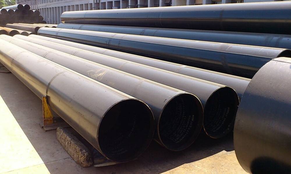 How do sonic tubes improve concrete testing in large-scale construction projects?